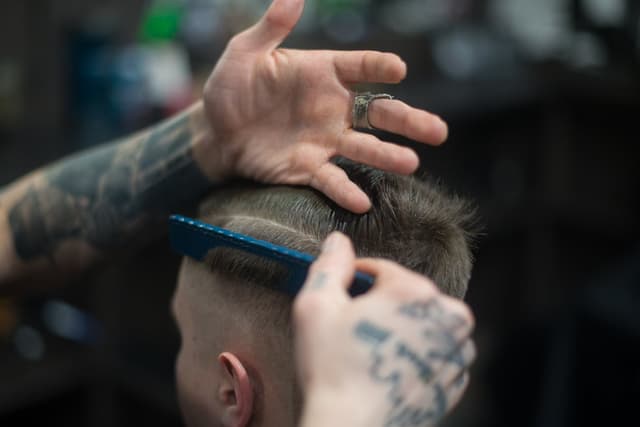 A person getting their haircut